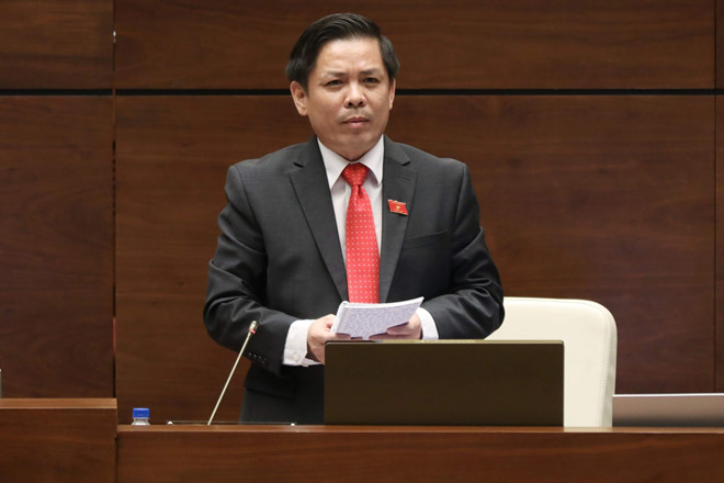 Bộ trưởng Nguyễn Văn Thể trong buổi trả lời chất vấn trước Quốc hội ngày 4/6. Ảnh: Chinhphu.vn