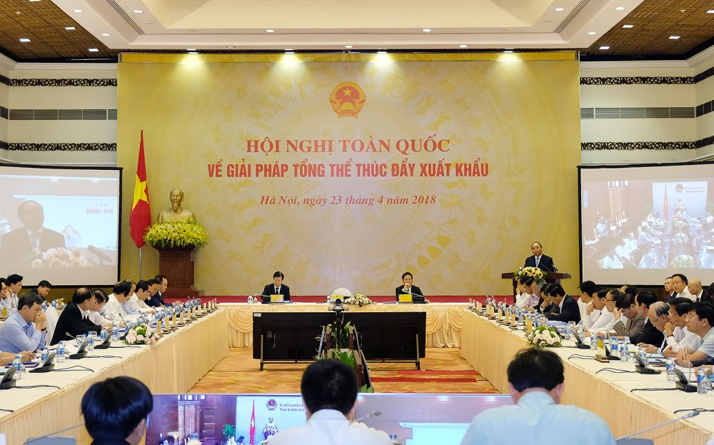 Hội nghị toàn quốc về giải pháp thúc đẩy xuất khẩu diễn ra sáng nay (23/4) dưới sự chủ trì của Thủ tướng Nguyễn Xuân Phúc - Ảnh: VGP/Quang Hiếu