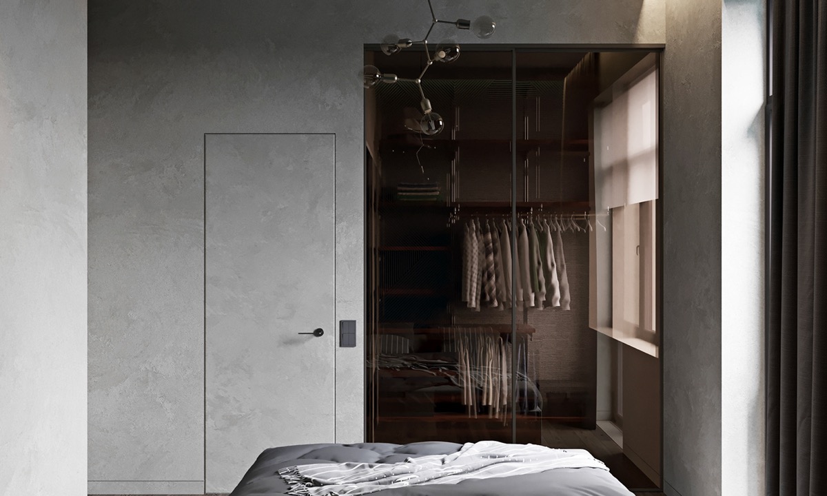 Để giúp căn phòng có cảm giác rộng hơn, tất cả cánh cửa trong phòng đều được dán giấy cùng màu tường. Tủ quần áo với cánh tủ bằng kính cũng giúp căn phòng 