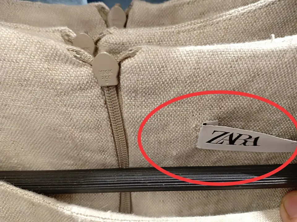Sản phẩm của Zara bày bán trên kệ hàng đã bị bung mác...