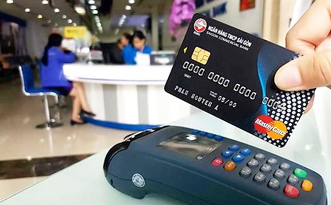 Theo đúng lộ trình, đến năm 2021, toàn bộ 75 triệu thẻ ATM được đổi sang thẻ chip. (Ảnh minh họa)