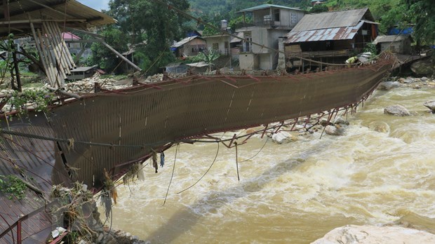 Mưa lớn và lũ quét gây nhiều thiệt hại tài sản ở Lào Cai - Ảnh 1